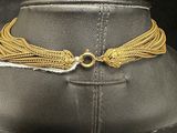 a close up of a necklace on a mannequin mannequin mannequin mannequin mannequin mannequin mannequin mannequin