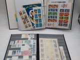 a folder with stamps on it sitting on a table