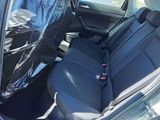 the back seat of a car with a seat belt in it