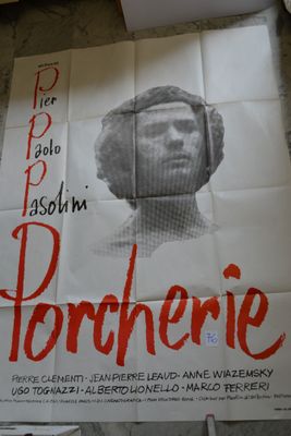a large poster of a man with a beard on it