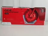 packaging of a red motorcycle wheel on a white surface