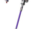 a close up of a cordless vacuum cleaner with a blue handle