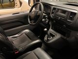 a car that is sitting in a car showroom