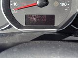 a close up of a speedometer on the dashboard of a car
