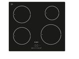 a black stove top with four burners and four burners