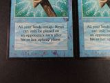 two cards that are sitting on a table