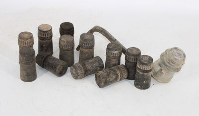 many different types of pipes and valves on a white surface