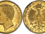 l'image d'une pièce d'or sur laquelle figure le portrait d'un homme