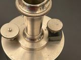 a silver object that is sitting on a table