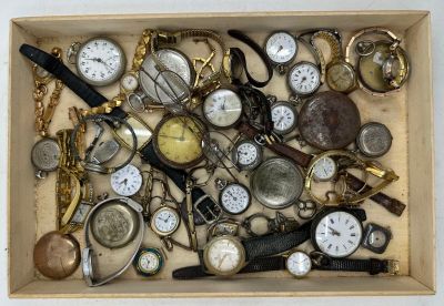 a wooden box filled with lots of different types of watches