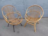 pair of vintage rattan chairs in the style of a pair of chairs