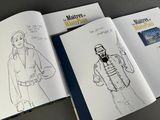 a book with a drawing of a man holding a gun