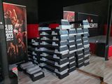 a lot of boxes stacked on top of each other on the floor