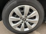 a close up view of a tire on a car