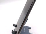 a close up of a cell phone on a stand