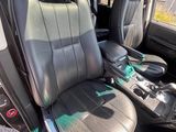 the interior of a car with black leather seats and gray trims