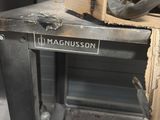 a picture of a metal work bench with a helmet on top of it