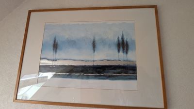 une photo d'un tableau accroché au mur