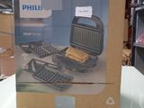 a box that has a phone and a keyboard in it