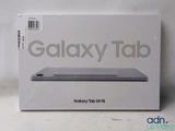 the box of the samsung tab is open on a white surface