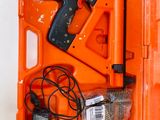 an orange case with tools in it on a white surface