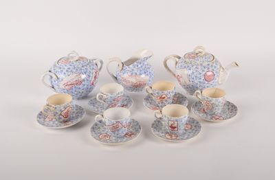 six pieces of porcelain tea and coffee set on a white surface