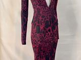 a red and black dress on a mannequin mannequin mannequin mannequin mannequin mannequin mannequin mannequin mann