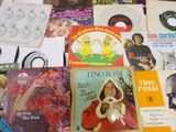 many different types of vinyl records on the table