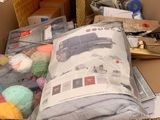 a box full of yarn and other items in the store