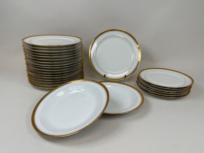 a lot of plates that are sitting on the table