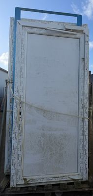 a large white door sitting on top of a pallet