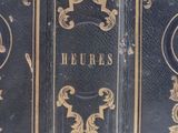three books that are sitting on top of each other