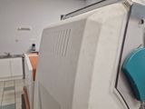 a machine that is sitting on a table in a room