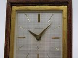 a clock that is hanging on the wall