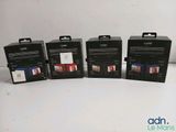 four boxes of different colors and sizes of printer paper