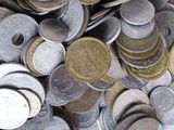 a pile of coins sitting on top of a table