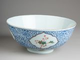 blue and white porcelain bowl with floral decoration on the rim