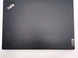a picture of a black laptop on a white surface