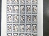 une photo d'une feuille de timbres sur laquelle figure l'image d'un homme