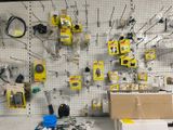 a picture of a wall of electronics in a store