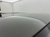 a car that is parked inside of a tent