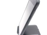 a cell phone that is sitting on top of a stand