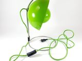 an image of a green lamp with a cord attached to it