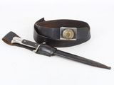 a leather belt with a metal buckle and a leather belt with a metal buckle