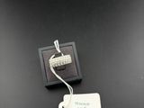 a close up of a ring on a black surface with a price tag