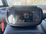 a digital display on the dashboard of a car