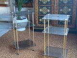 pair of lucine and brass side tables with glass tops