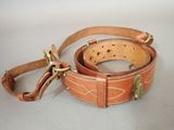 an image of a leather belt on a white surface