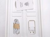 a white tray with a charger and a charger on it