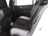 the back seats of a car with a black seat belt